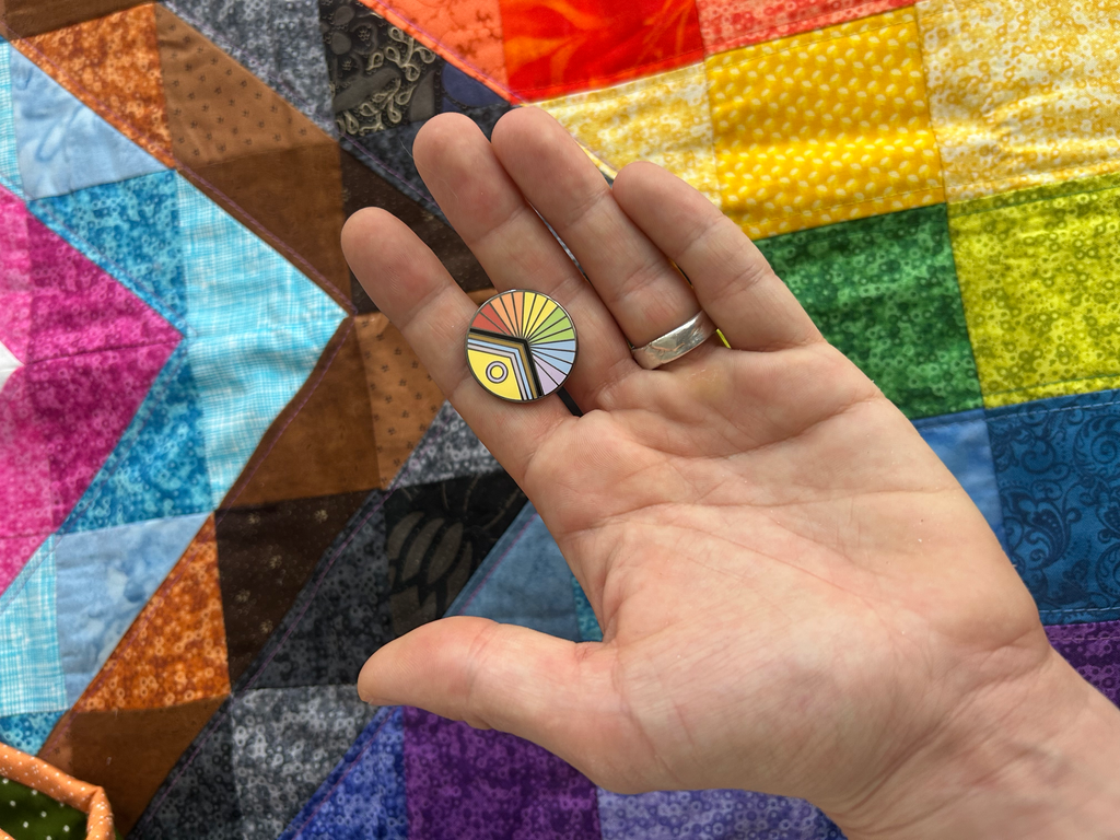 Queer progressive flag enamel pin